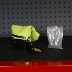 ABN clamp and brass fitting detail demonstrating durable, leak-resistant connection
