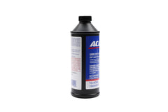 ACDelco bottle placed in an engine bay illustrating correct application and convenient size