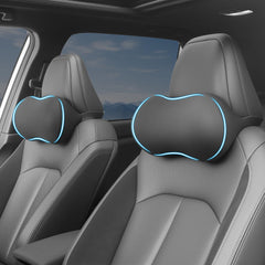 Arcoche front view showing two black headrest pillows, clear product benefit