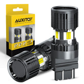 AUXITO front packaging showing two 3157 LED bulbs and bright white light benefit