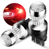 AUXITO front view of two 3157 strobe brake bulbs showing bright red output benefit