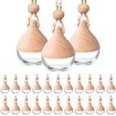 BBTO front view of 50 water-drop glass bottles showing bulk value and clarity