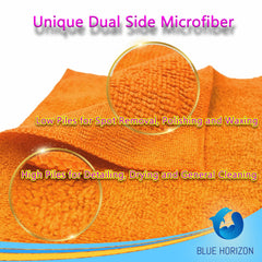 Blue Horizon towel held in hand demonstrating 16 by 16 inch scale and grip
