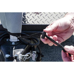 Camco cover installed on trailer jack demonstrating weather protection