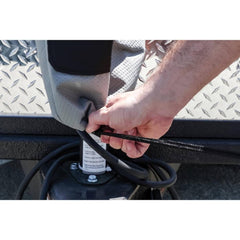 Camco jack cover next to ruler showing size and fit benefit