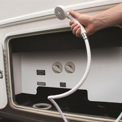 Camco shower head spray pattern demonstrating high-flow rinsing power