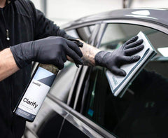 CARPRO Clarify being sprayed onto glass, fast cleaning action demonstrated