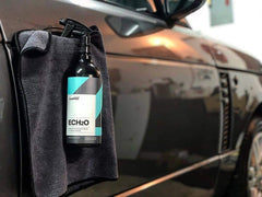 CARPRO ECH2O being sprayed on a vehicle panel demonstrating quick waterless cleaning