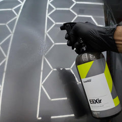 CARPRO EliXir being wiped with a microfiber to restore gloss quickly