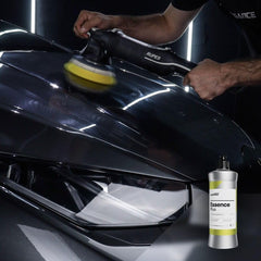 Hand holding CARPRO Essence PLUS bottle demonstrating easy application