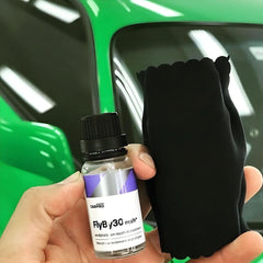 CARPRO FlyBy30 coated glass close-up showing smooth hydrophobic finish