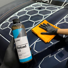 CARPRO Reload 2.0 gloss close-up on paint surface highlighting mirror-like reflection benefit