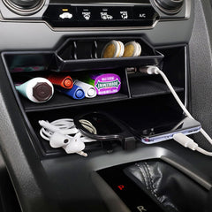 CarQiWireless open armrest hidden storage illustrating secure concealed compartment