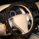 Carwales front view of black rhinestone steering wheel cover, adds elegant flair