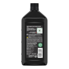 Castrol Transmax being poured into a transmission showing precise application benefit