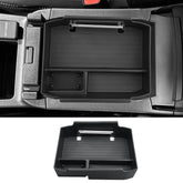 CDEFG front view of organizer tray fitting snugly in Outback console, neat storage