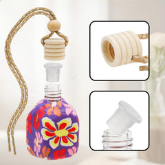 Covzoe bottle hanging from car mirror offering discreet fragrance diffusion