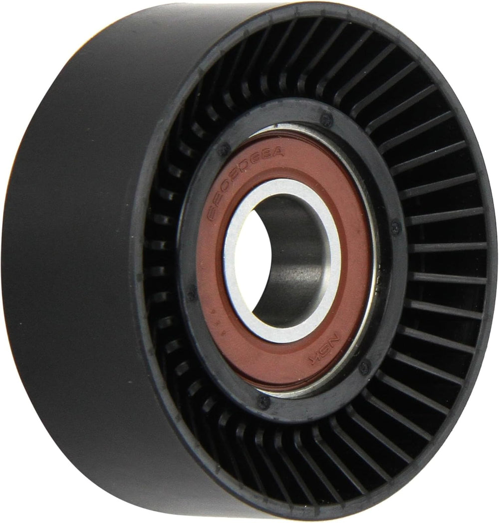 Dayco idler pulley front view showing mounting hole and smooth polymer surface benefit of precise fit