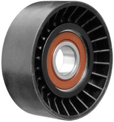 Dayco idler pulley installed on engine showing correct belt routing and improved belt tension