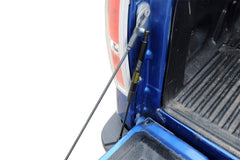 DEE ZEE installed on F-150 tailgate side view providing steady lowering