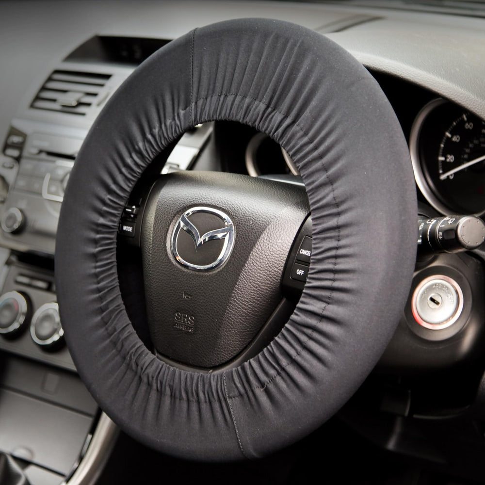 Disklok front view of black steering wheel cover protects wheel finish