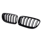 DOCAS front view gloss black grilles showing sleek facelift benefit
