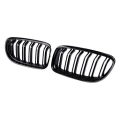 DOCAS front view gloss black grilles showing sleek facelift benefit