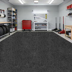 DOLZO full-size garage mat laid out protecting concrete floor