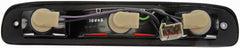 Dorman 923-206 installed on pickup rear window demonstrating OEM fit and restored brake signaling