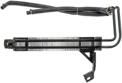 Dorman power steering cooler next to ruler for scale illustrating exact fit and easy replacement