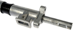 Dorman shift tube with included hardware next to ruler for size and fit reference