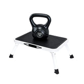 DUMOS stool front view showing sturdy metal frame and stable platform