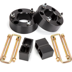 Dynofit front spacers close up showing precision and improved ride height
