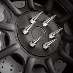 dynofit chrome lug key beside nut, illustrating easy installation