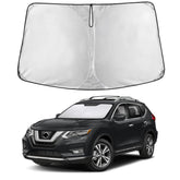 EcoNour front-facing sunshade installed in Nissan Rogue showing complete windshield coverage and cooling benefit