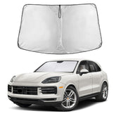 EcoNour front view showing full windshield coverage and perfect Porsche Cayenne fit