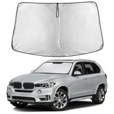 EcoNour front view showing fitted sunshade on BMW X5 windshield protecting interior