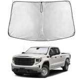 EcoNour front view showing exact fit on Silverado windshield preventing sun glare