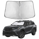 EcoNour front view sunshade fitted in Highlander showcasing full windshield coverage benefit