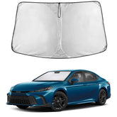 EcoNour front view installed on a Camry windshield reducing cabin heat