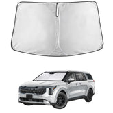 EcoNour front view on Kia Carnival showing full windshield coverage and sun protection