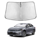 EcoNour front view sunshade covering VW Jetta windshield, maximizes shade