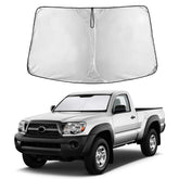 EcoNour sunshade front installed on Tacoma windshield showing full coverage and sun protection