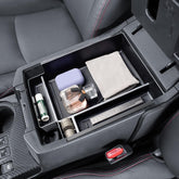 EDBETOS front view of console tray showing organized compartments and clean fit