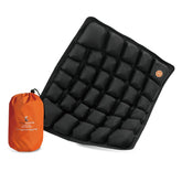ERGOOCUSHION front view showing compact packed shape and portability