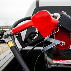 Fill-Rite nozzle in use refueling equipment, demonstrating automatic shut-off and spill reduction