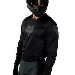 Fox Racing 180 Blackout back with drop-tail hem keeping jersey tucked during rides