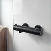 FUGO front view of black thermostatic valve showing sleek controls and benefit of intuitive operation