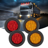 FXC front view of amber and red 2-inch round marker lights showing compact visibility benefit