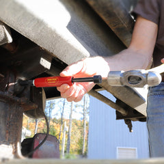 Close-up of Grease Buster coupler by LockNLube highlighting durable connection